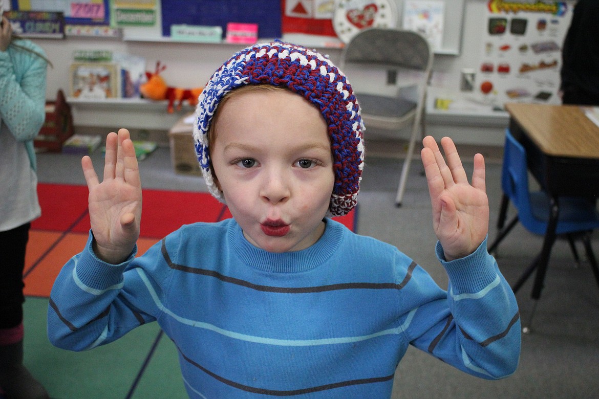 Superior Kindergartener Kalub Lewis shows off his new hat given to elementary students made by the Superior United Methodist Church Women&#146;s Group and the library CAKL ladies.