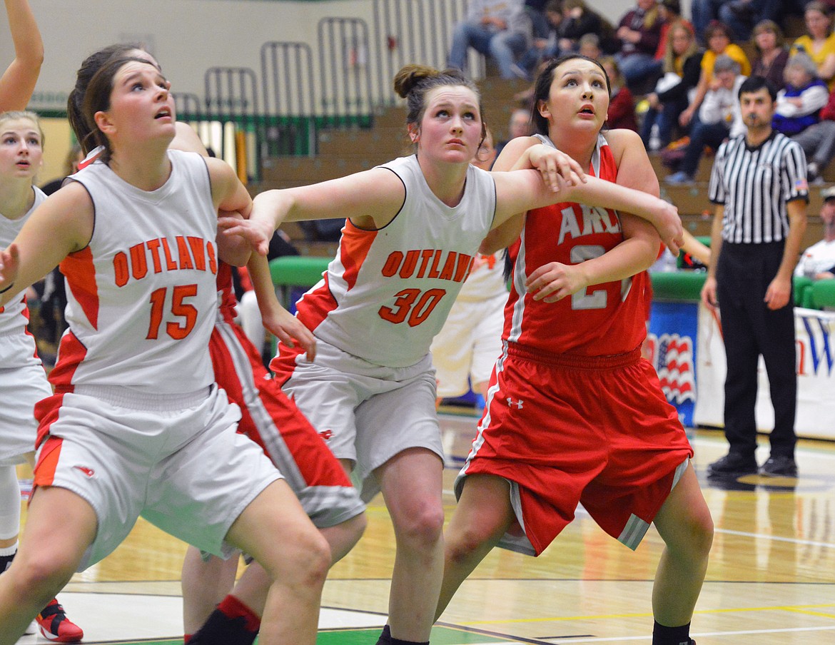 ARLEE GIRLS celebrate after their 44-38 victory over Winifred-Roy Friday night at the Belgrade Special Events Center. (Jason Blasco/Lake County Leader)