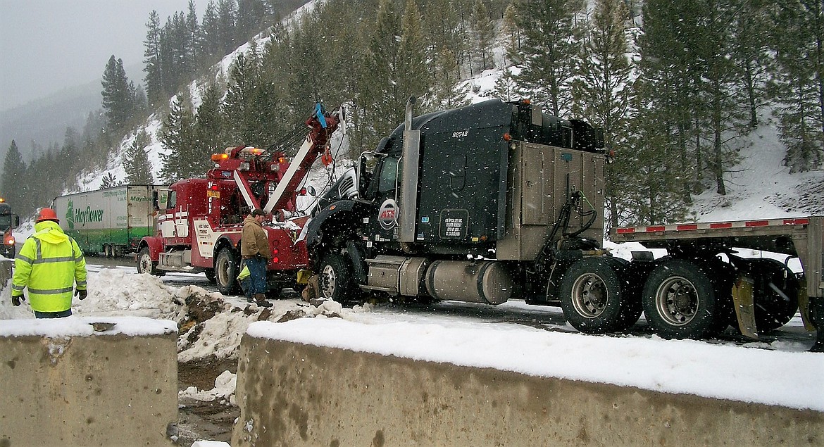 A flatbed truck hauling cable lost control near St. Regis and knocked cement barriers into the eastbound lane on March 1. The westbound hit the barriers on March 1 near St. Regis. (Photos courtesy of Tim Read)