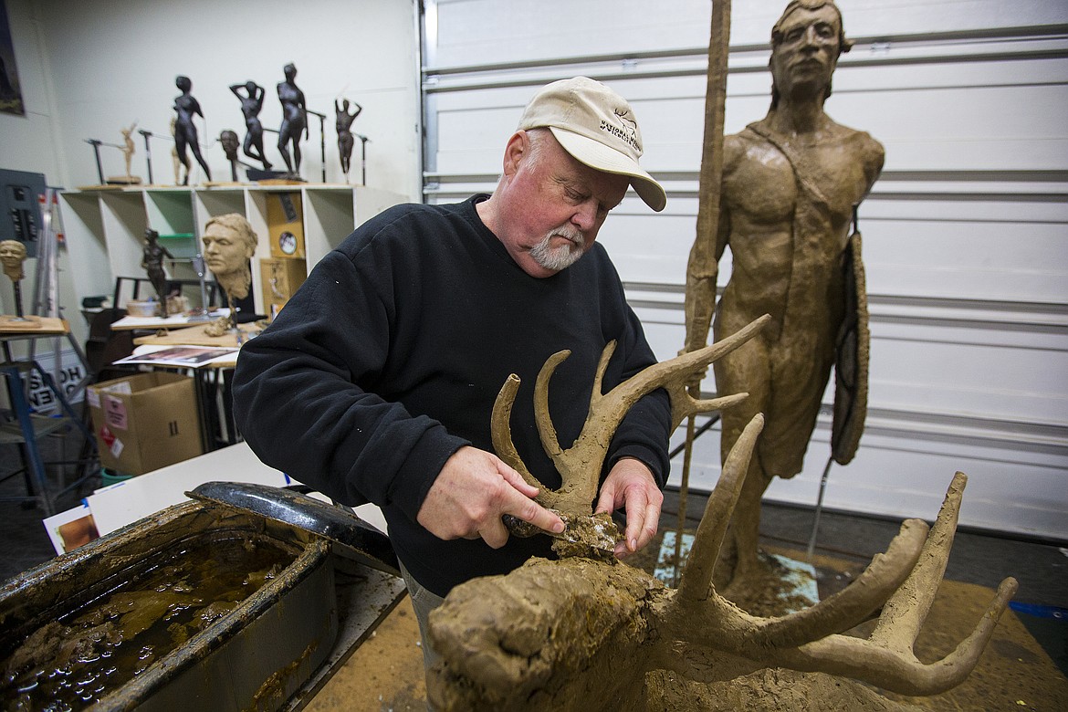 LOREN BENOIT/Press

Terry Lee adds an antler to an elk sculpture inside his Hayden studio on Feb. 16, 2017. Lee has been sculpting for many years, with his most well-known sculptures being several life-size Mudgy and Millie moose along the The Mudgy Moose Trail in Coeur d&#146;Alene.