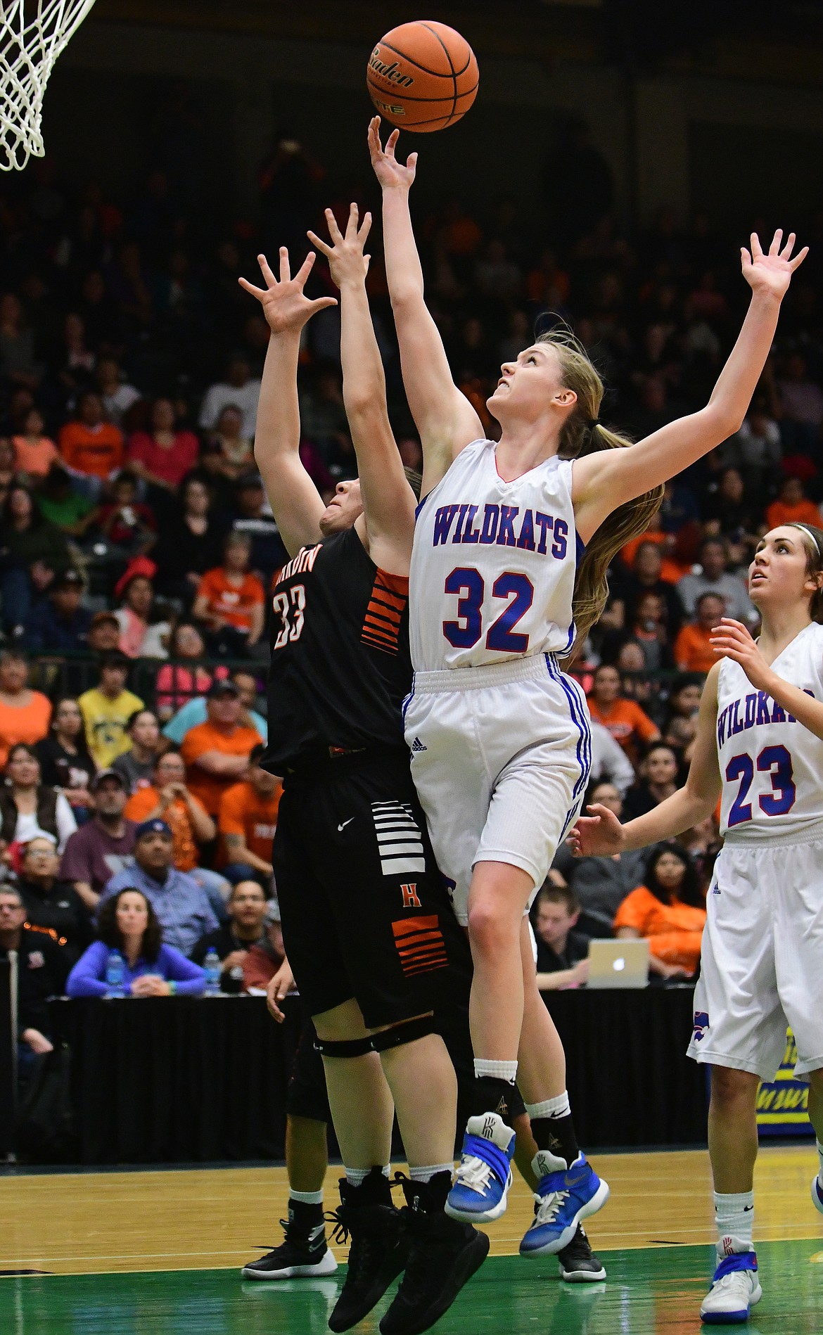 Kiara Burlage fights for a rebound  against Hardin&#146;s Arena Penty.