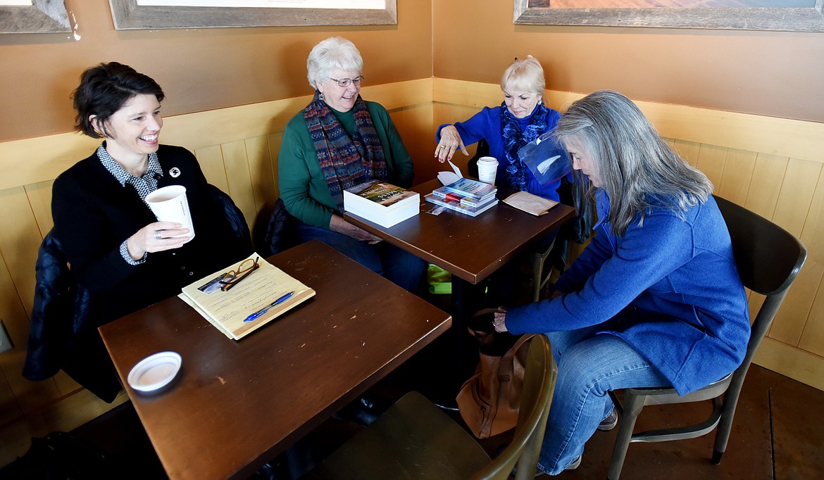 FROM LEFT: Self-published authors Kathy Dunnehoff, Marie F. Martin, Betty Kuffel and Ann Minnett gather at Starbucks in Kalispell on Tuesday, Feb. 28.
(Brenda Ahearn photos/This Week in the Flathead)