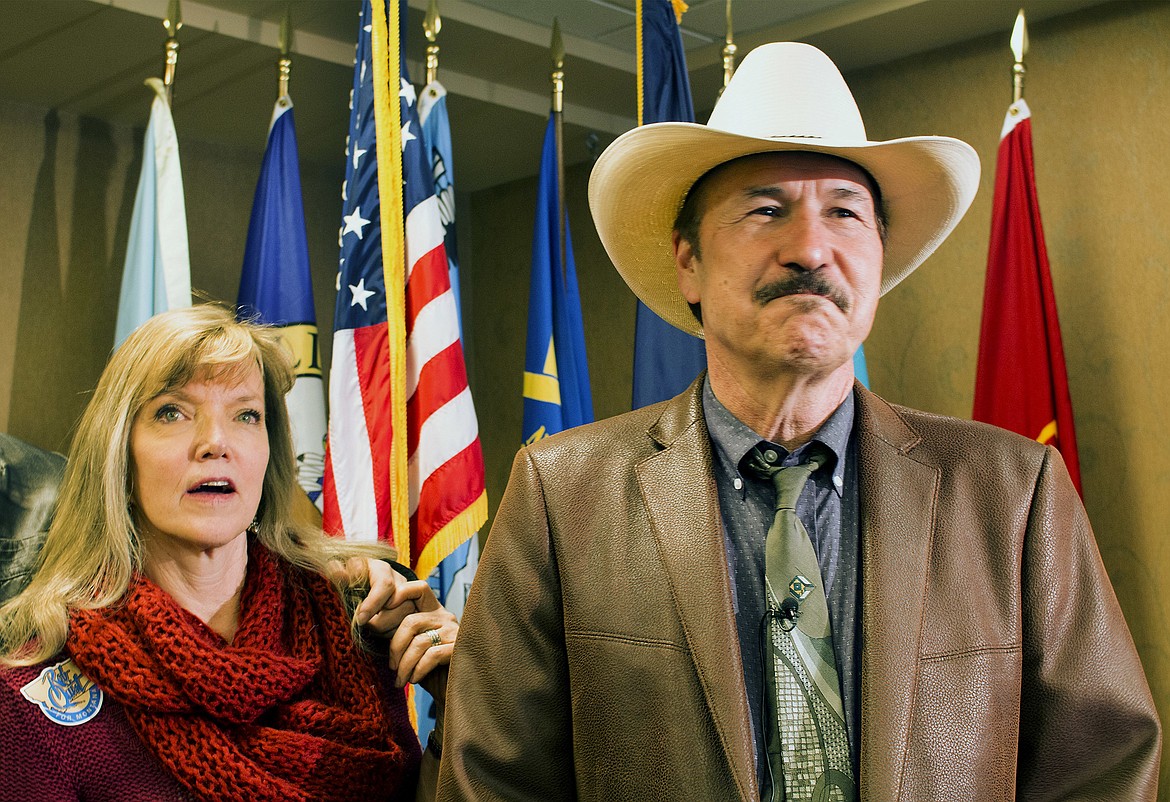 Rob Quist and wife Bonni react after he is named as the Montana Democratic Party&#146;s nominee to fill the state&#146;s U.S. House seat. (AP Photo/Bobby Caina Calvan)