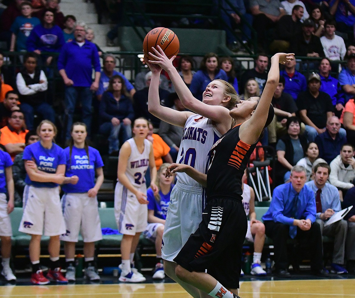 Cydney Finberg drives to the basket against a Hardin defender.