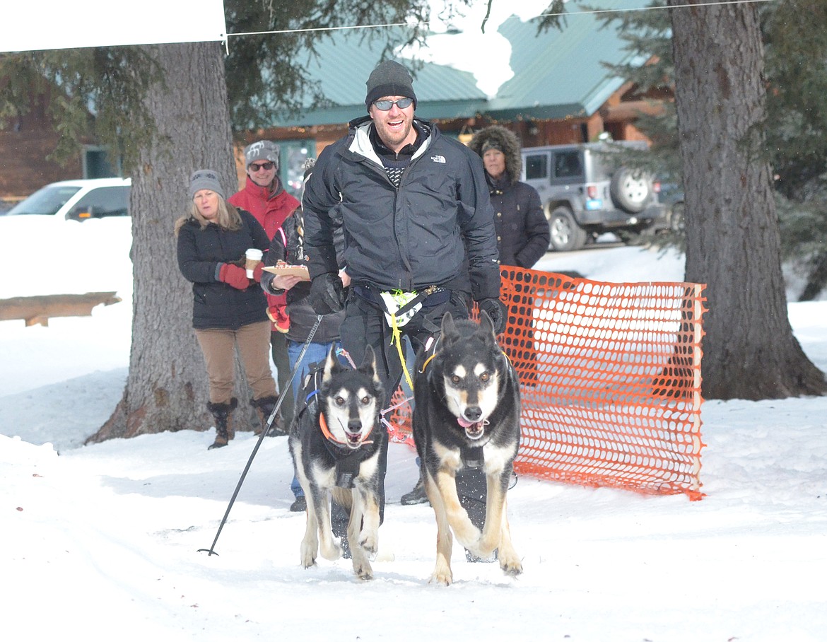 Phillip McGrady of Columbia Falls takes off from the start line Saturday during the two-dog skijoring race.