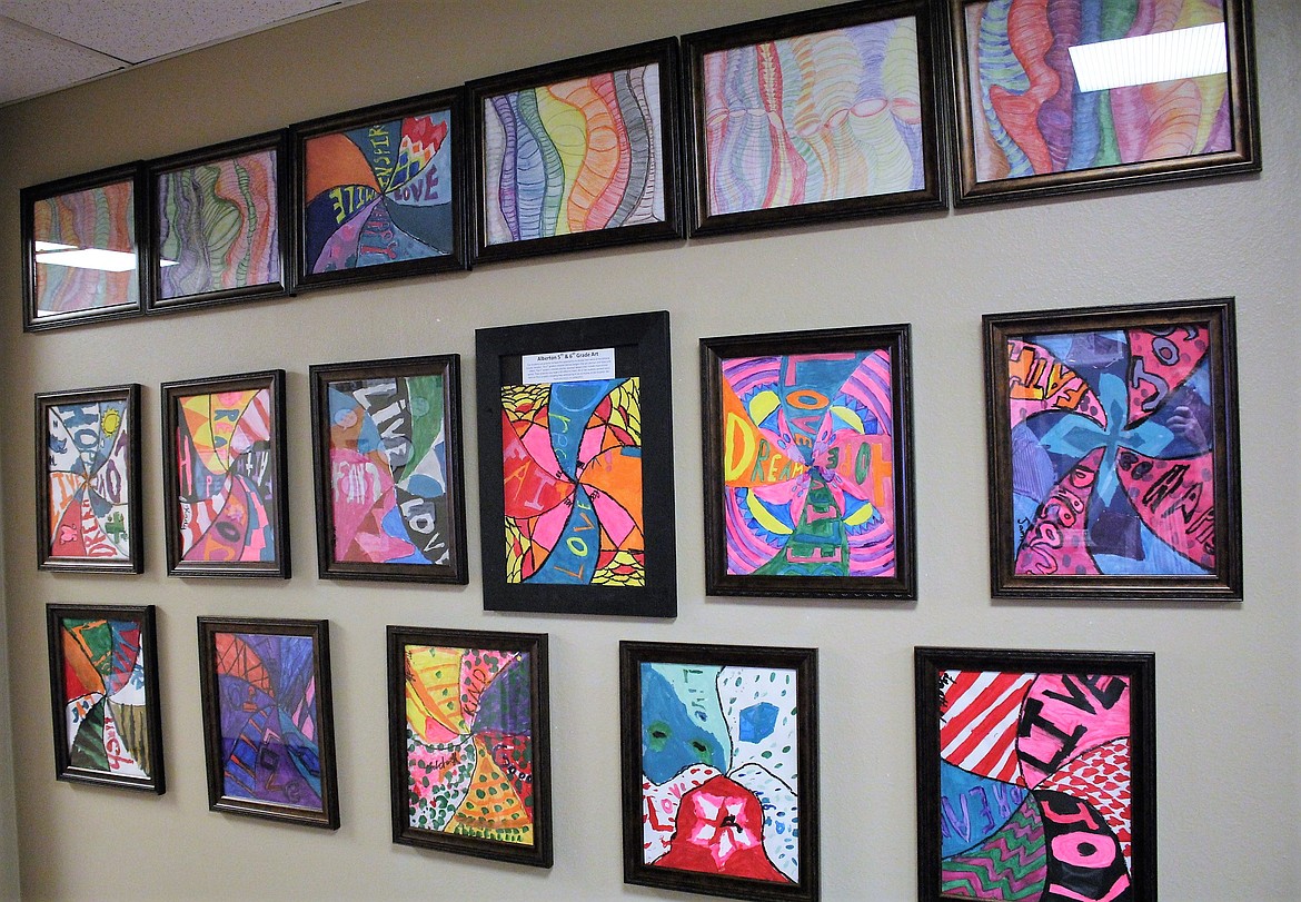 The Alberton fifth- and sixth-grade art class created a display of &#147;Optical Design&#148; pieces to adorn the wall at Mineral Community Hospital. (Kathleen Woodford/Mineral Independent).