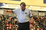 After 50 years, no quit in George wrestling ref
