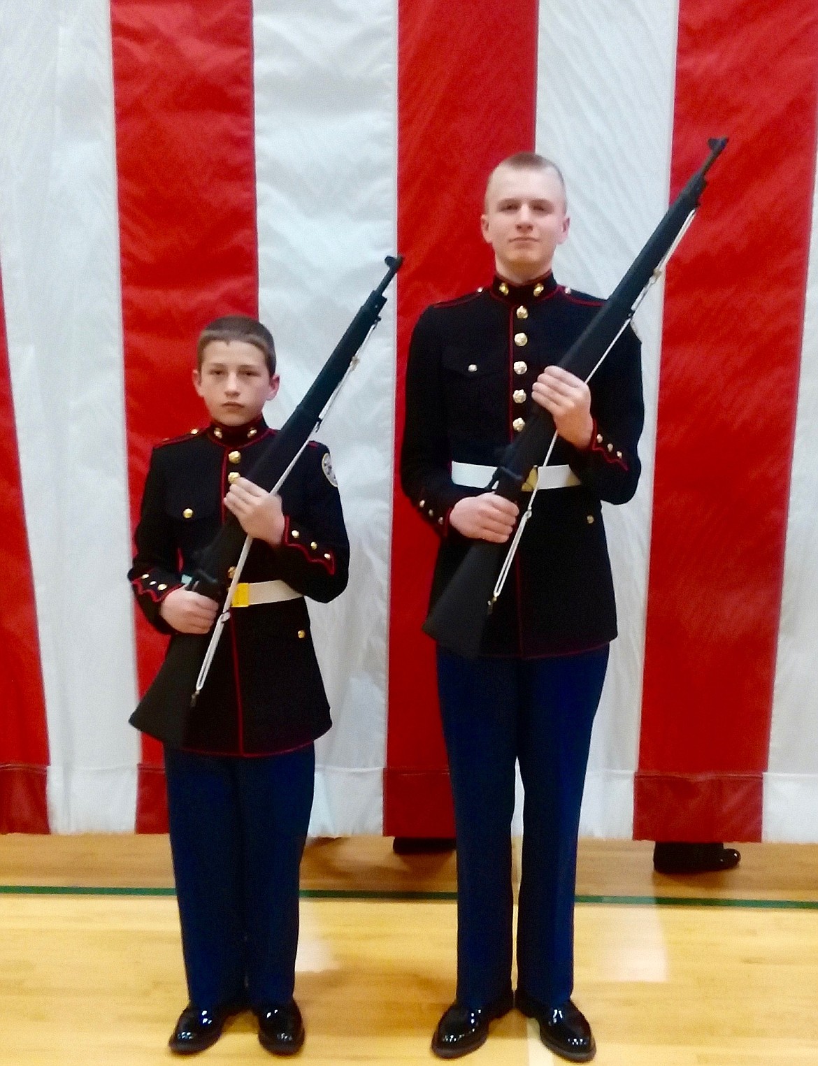 Junior cadets Ethan Tomczyk and Taylor Domonoske, who won second and third place respectively in an individual rifle drill competiton.