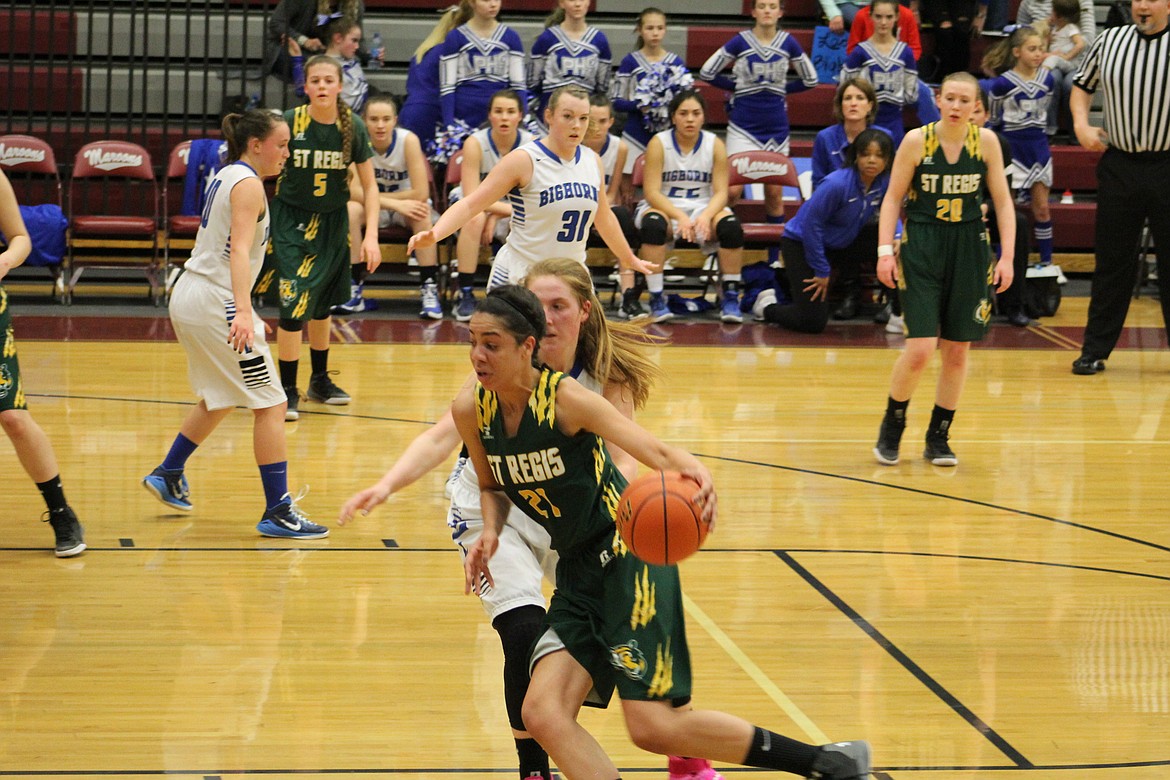 Tiger, Justice Tate goes in for a lay-up against Lone Peak player during Thursdays matchup against Lone Peak in Butte. (Kathleen Woodford/Mineral Independent).