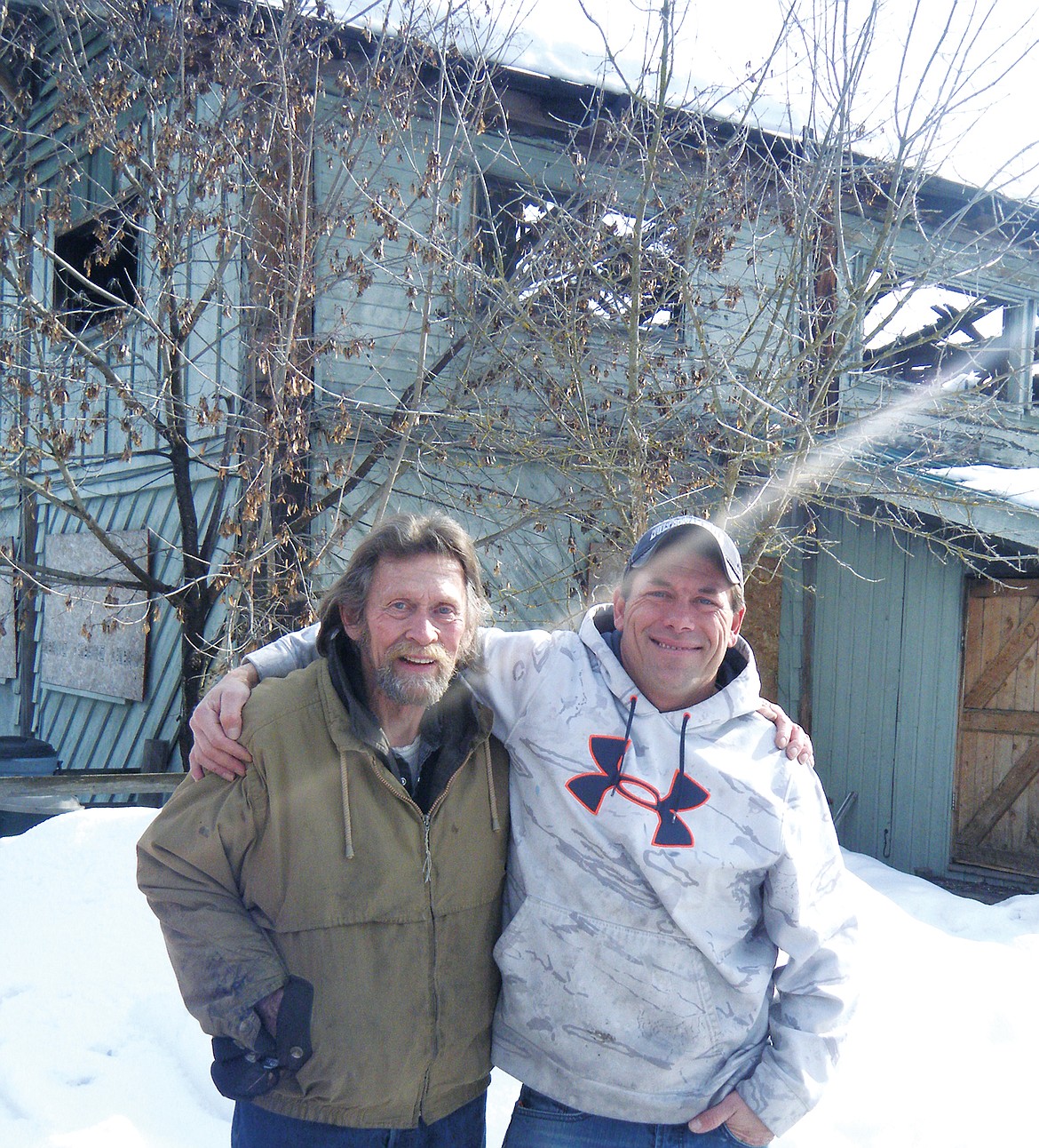 Charles Curtis and his son Shane plan to restore and re build the burnt building. (Elka Wood/TWN)