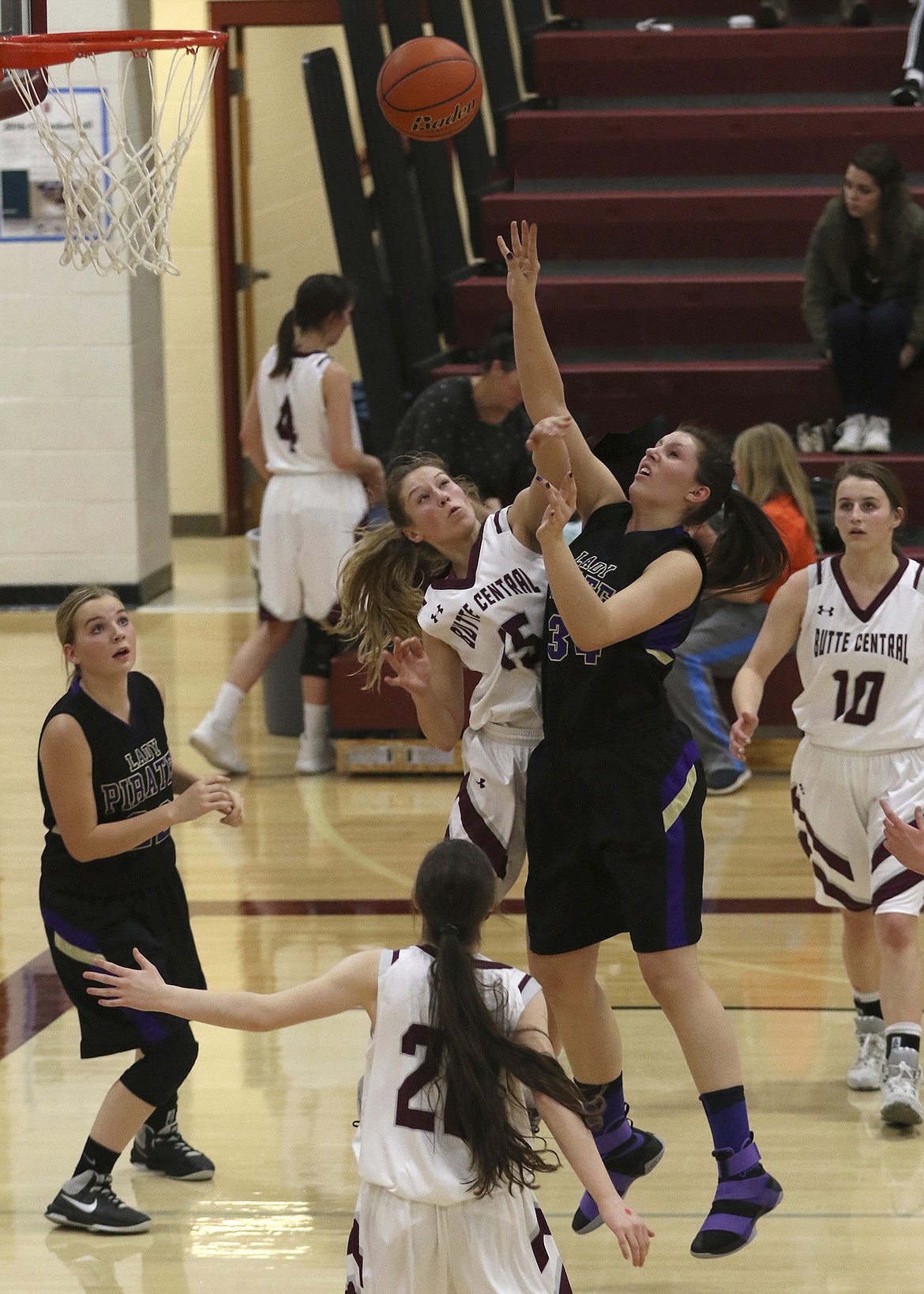 POLSON CENTER Mollie Fisher attempts a jump shot in the first round of the Western Class-A Divisional Tournament against the defending Class-A Champion Butte Central Lady Maroons. Fisher will be one of the key contributors Polson will lose because of graduation as they begin their preparations  for the 2017-2018 after ending their season with losses to Butte Central and Whitefish in the double-elimination format. (Photo provided by Bob Gunderson)