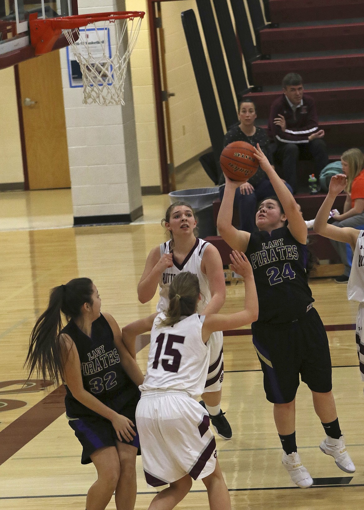 POLSON LADY Pirate guard Rhiley Big Beaver attempts a jump shot against Butte Central in the first round of the Western Class-A Divisional against Butte Central. The Lady Pirates 2016-2017 campaign ended with losses to Butte Central and Whitefish in a double-elimination format. (Jason Blasco/Lake County Leader)