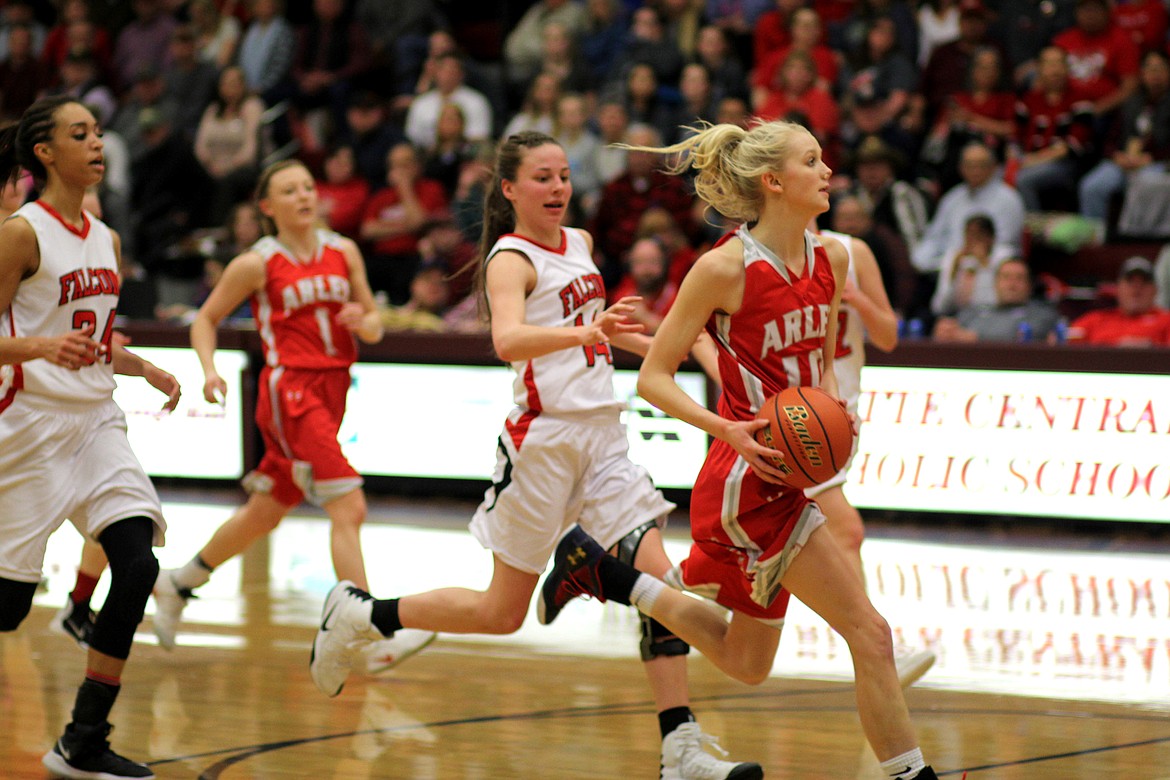 Arlee&#146;s Carly Hergett goes to the basket against Twin Bridges in the Divisional Championship game in Butte Saturday. (Kathleen Woodford/Lake County Leader)