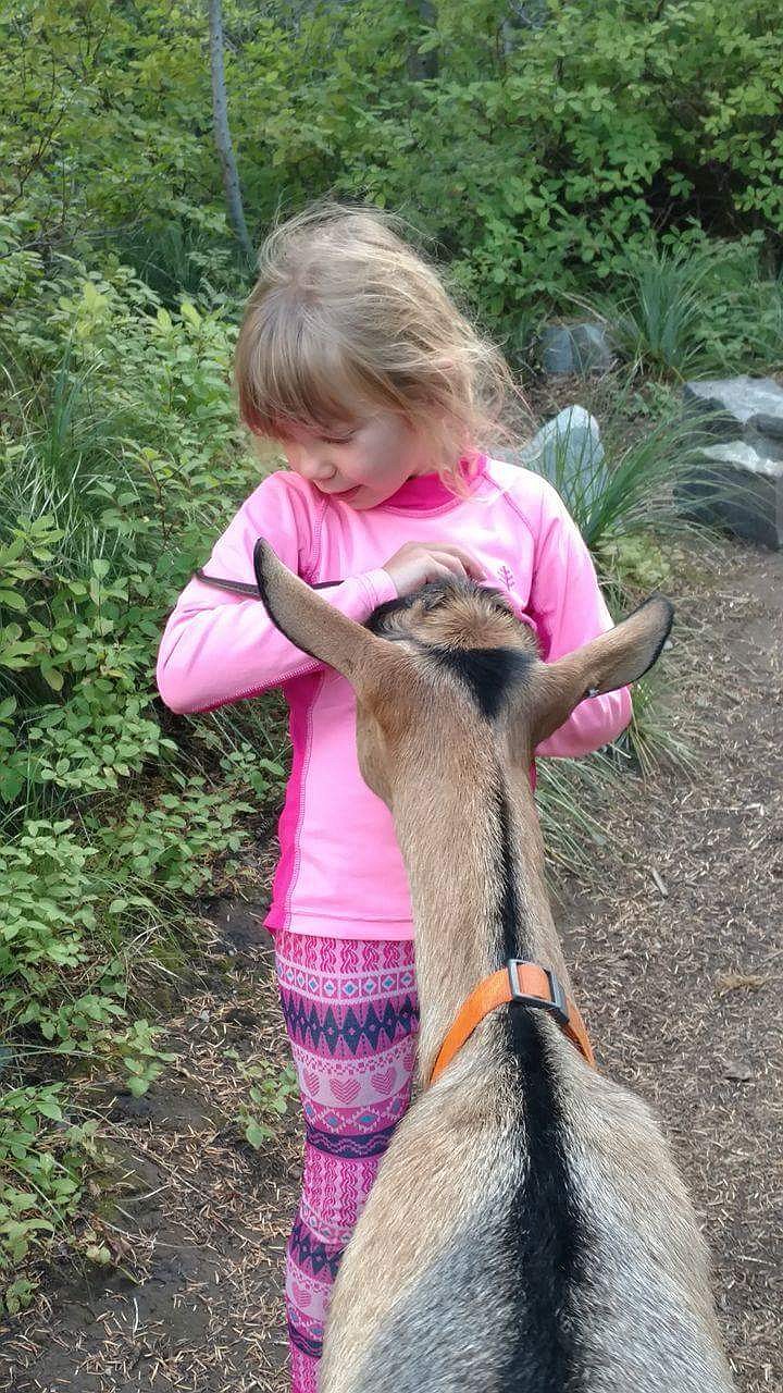 Tank shares Ella's curiosity and enthusiasm for the garden snake she found while out hiking.