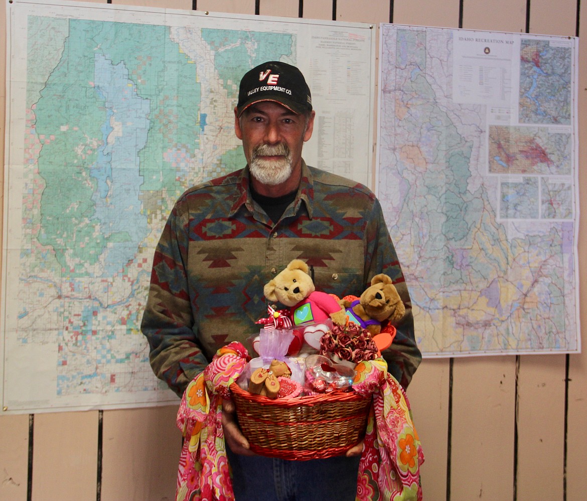 &#151;Photo by DAC COLLINS
Bill Bustillos, who works for Boundary County Road and Bridge, was another winner in this year's Friends of the Restorium's Valentine's Day Raffle.