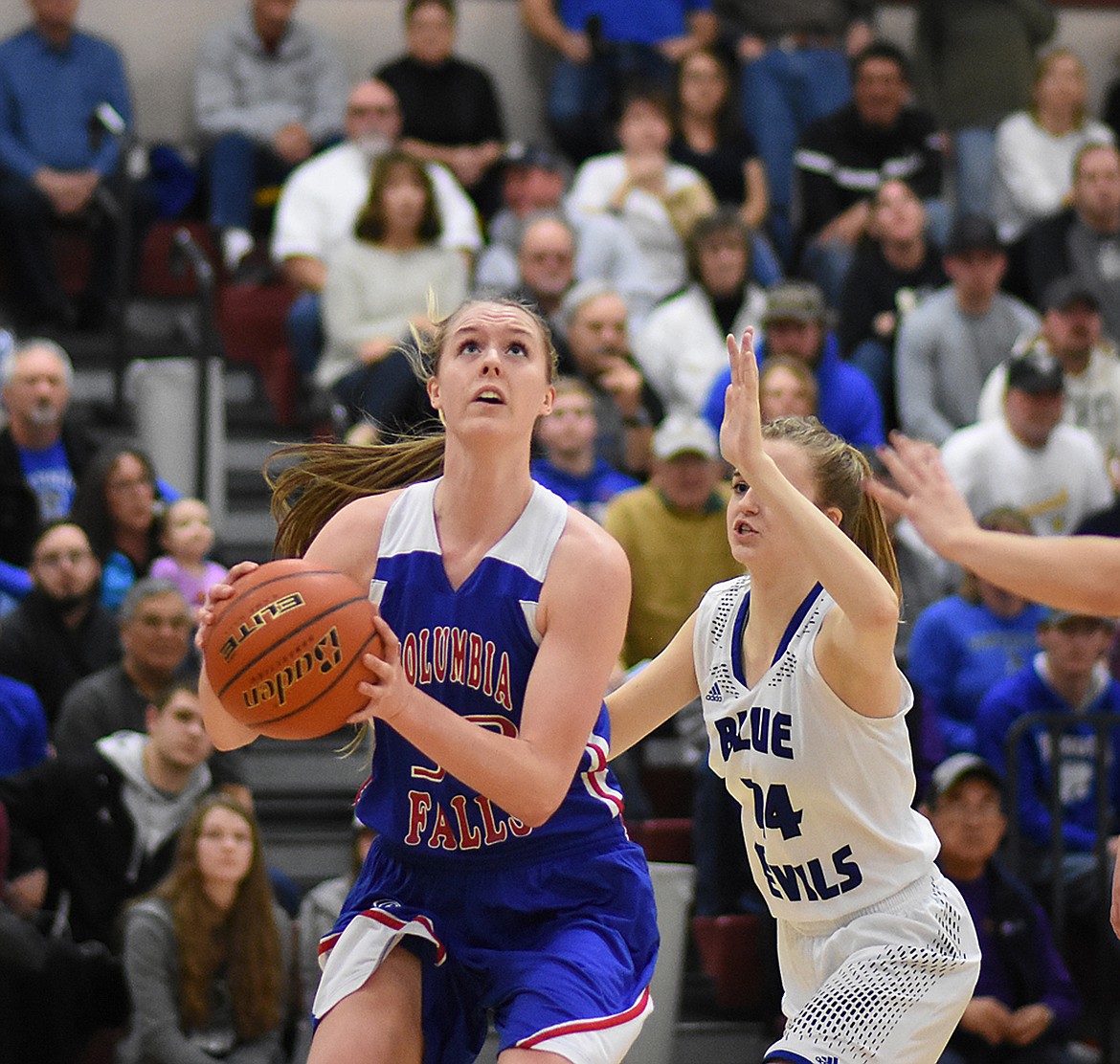 Kiara Burlage looks to take a shot against Corvallis.