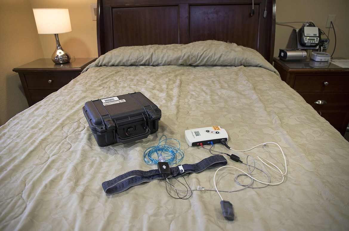 LISA JAMES/PressA Home Sleep Apnea Test, HSAT, sits on the bed of the Kootenai Health sleep lab, where patients spend the night to be observed. The HSAT allows patients to monitor the breathing and sleep patterns at home, using electrodes and other methods of measuring via tubes and wires they connect to their bodies.