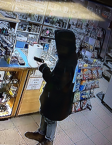 A thin, white, 5-foot-6 male in his early 20s is being sought for Saturday night&#146;s armed robbery of Jordan&#146;s Grocery.