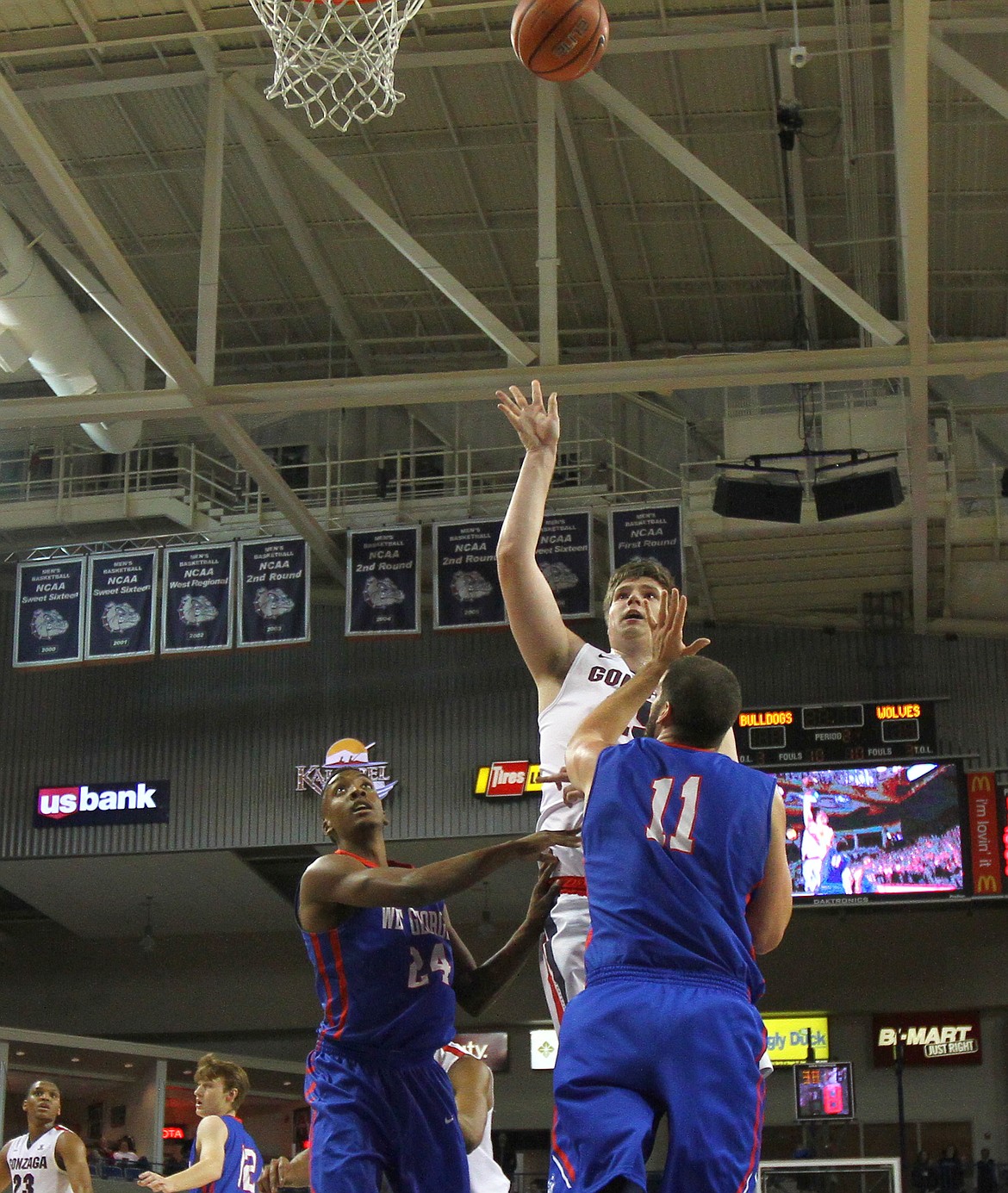 Gonzaga center Ryan Edwards lofts a shot over a pair of defenders in an exhibition game against West Georgia in November in Spokane, Wash. Edwards, a redshirt junior, has been on the two best teams in Gonzaga history and will look to help the Bulldogs to another deep run in the NCAA men&#146;s basketball tournament. (Gonzaga Athletics photo)