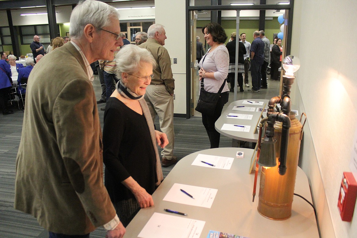 Richard Byrd/Columbia Basin Herald
The items up for bid in the silent auction during Youth Dynamics&#146; annual fundraiser were many, and quite curious in some instances, Saturday night at CB Tech.