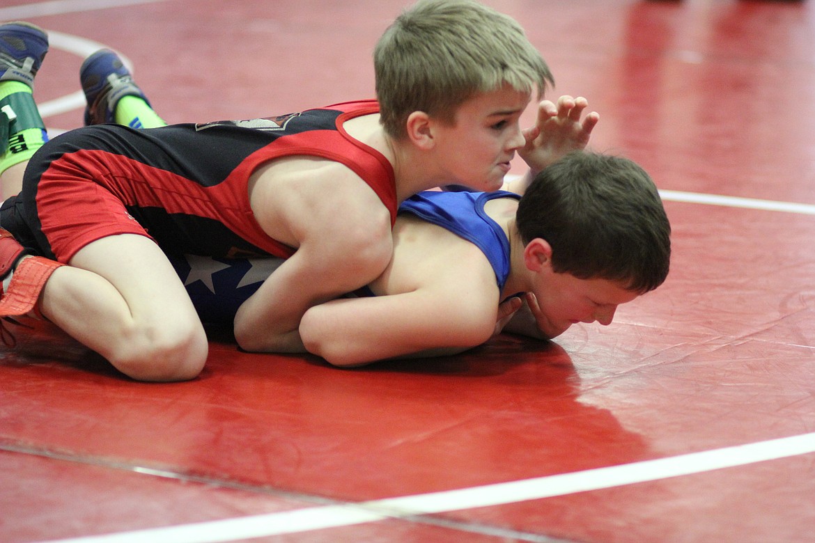 Johhny Waterbury wrestling Columbia Falls wrestler Wade Calloway.