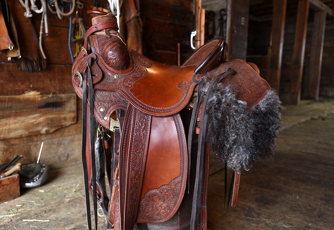 Jeff Morrow made this chestnut-colored saddle for himself in 2012. He calls the swell fork saddle Hog Heaven. (Aaric Bryan/Daily Inter Lake)