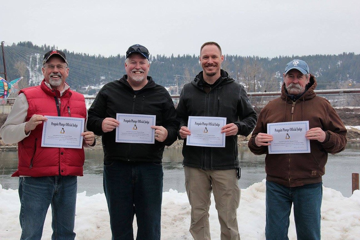 &#151;Photo by KRAMER PHOTOGRAPHY
Judges from left, Rick Alonzo, Joel Minor, Rick Collodi, and Gary Pflueger at the 2017 Special Olympics Penguin Plunge.