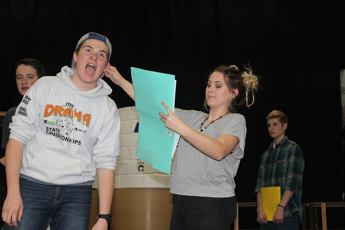 (Courtesy photo)
Cast members from &#147;Once Upon a Mattress&#148; rehearse a scene from the musical. Pictured are Saharah Chalupny as Queen Aggravain and Devin Fredericks as The Jester, with Zane Rasor as King Sextimus the Silent and Alexander Riach as the Wizard looking on.