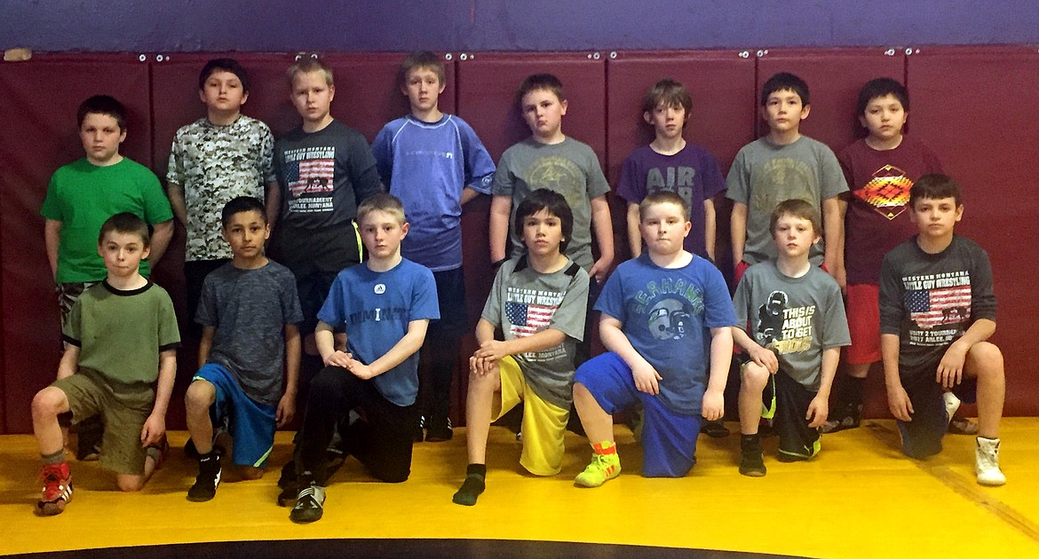 THE POLSON Little Guy Novice wrestlers pose after they won medals in the Little Guy Wrestling Tournament in Arlee. (From top, from left): Jerium Rushing, Patrick Hameline, Zander Benson, James Hubbs, Tucker Bohn, Micah Craig, Indy Moll, and Xavier Pierre. (From Bottom, from left): Jack Edwards, Max Ramsar, Teague McEwee, Adrian Nichols, Nathaniel Dotson, Andrew Cook, and Nathan Hewankorn. (Photo By Jason Blasco/Lake County Leader)