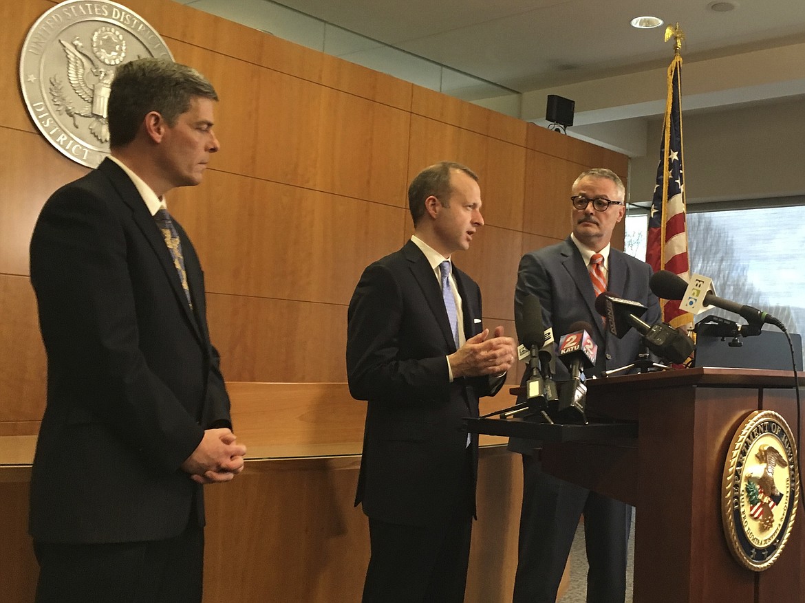 From left to right, Federal prosecutors Geoffrey Barrow, Ethan Knight, and U.S. Attorney for Oregon Billy Williams speak at a news conference in Portland, Ore., on Friday, March 10, 2017, following the conviction of two men of conspiracy to impede federal officers during last year&#146;s high-profile armed occupation of an Oregon wildlife refuge. Two other defendants were acquitted of the conspiracy charge but found guilty of deprivation of government property at Malheur National Wildlife Refuge. (AP Photo/Steven Dubois)
