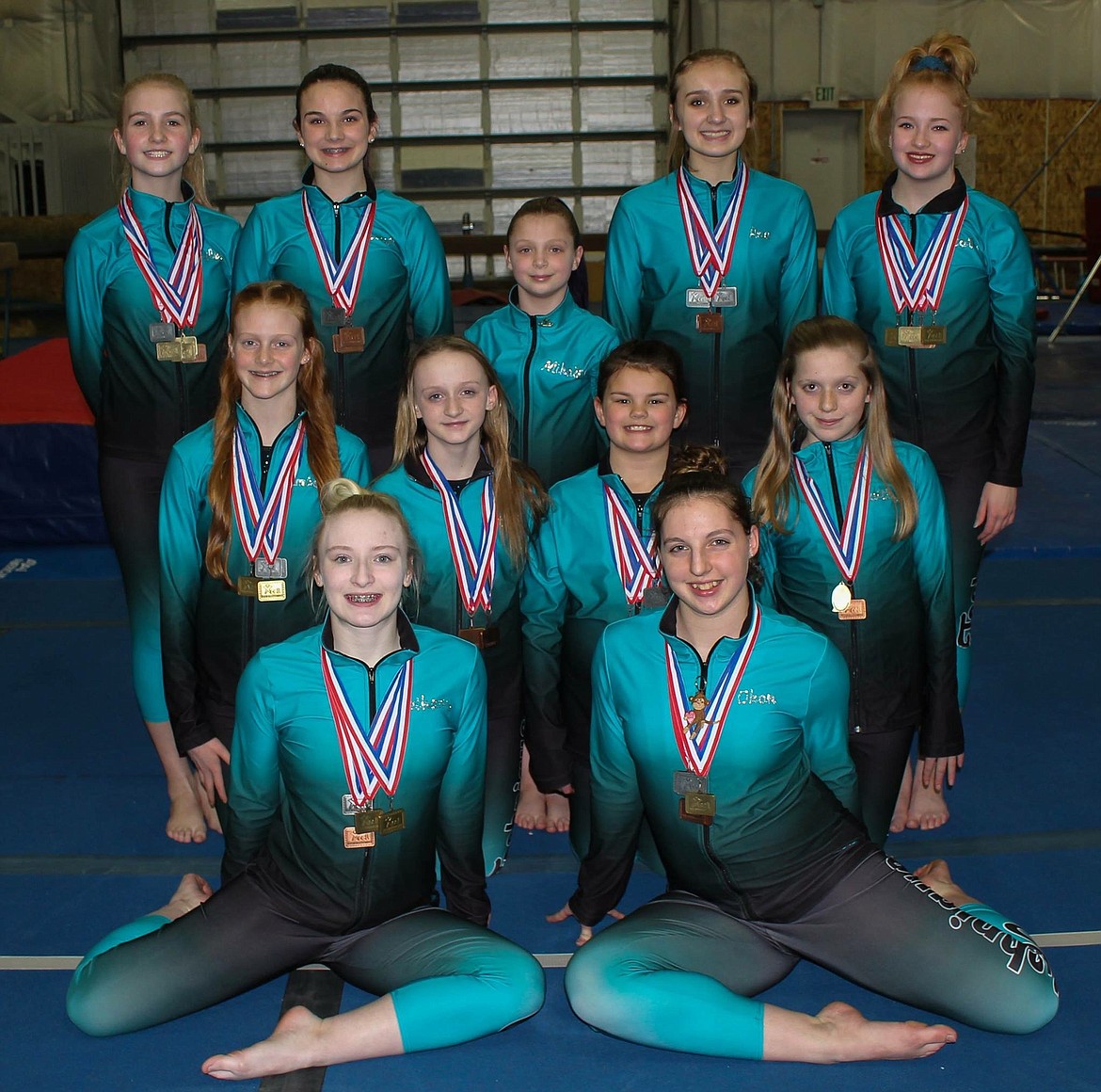 Courtesy photo
Technique Gymnastics girls who attended the Xcel state meet March 10-12 in Boise are, front row from left, Xcel Platinums; Bethany Frey and Mallory Okon; second row from left, Xcel Silvers; Amber Shoolroy, Katie Kirk, Taylor Payne and Kaitlynn Butler; and back row from left, Xcel Golds; Rylee Strobel, Karsyn Crawford, Mikalah Shouse, Ana Pearse and Natalie Brett.