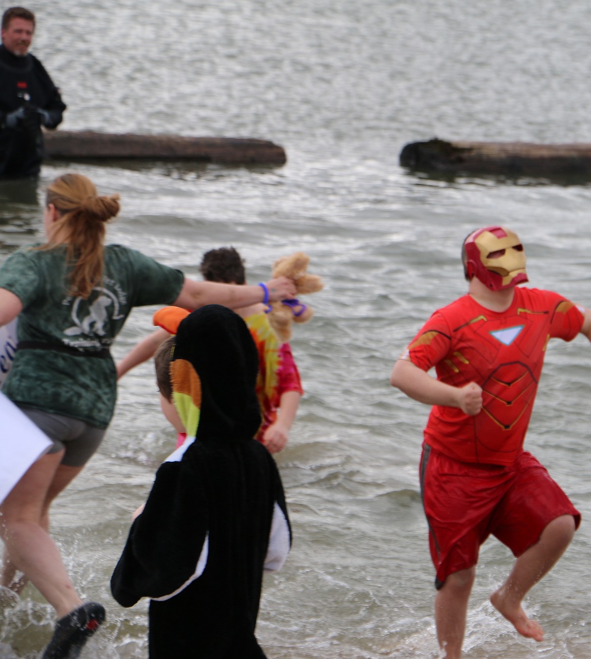 (Photo by MARY MALONE)
All sorts of characters came out for a chilly dip in Lake Pend Oreille Saturday during the annual Penguin Plunge fundraising event at City Beach to benefit Idaho Special Olympics.