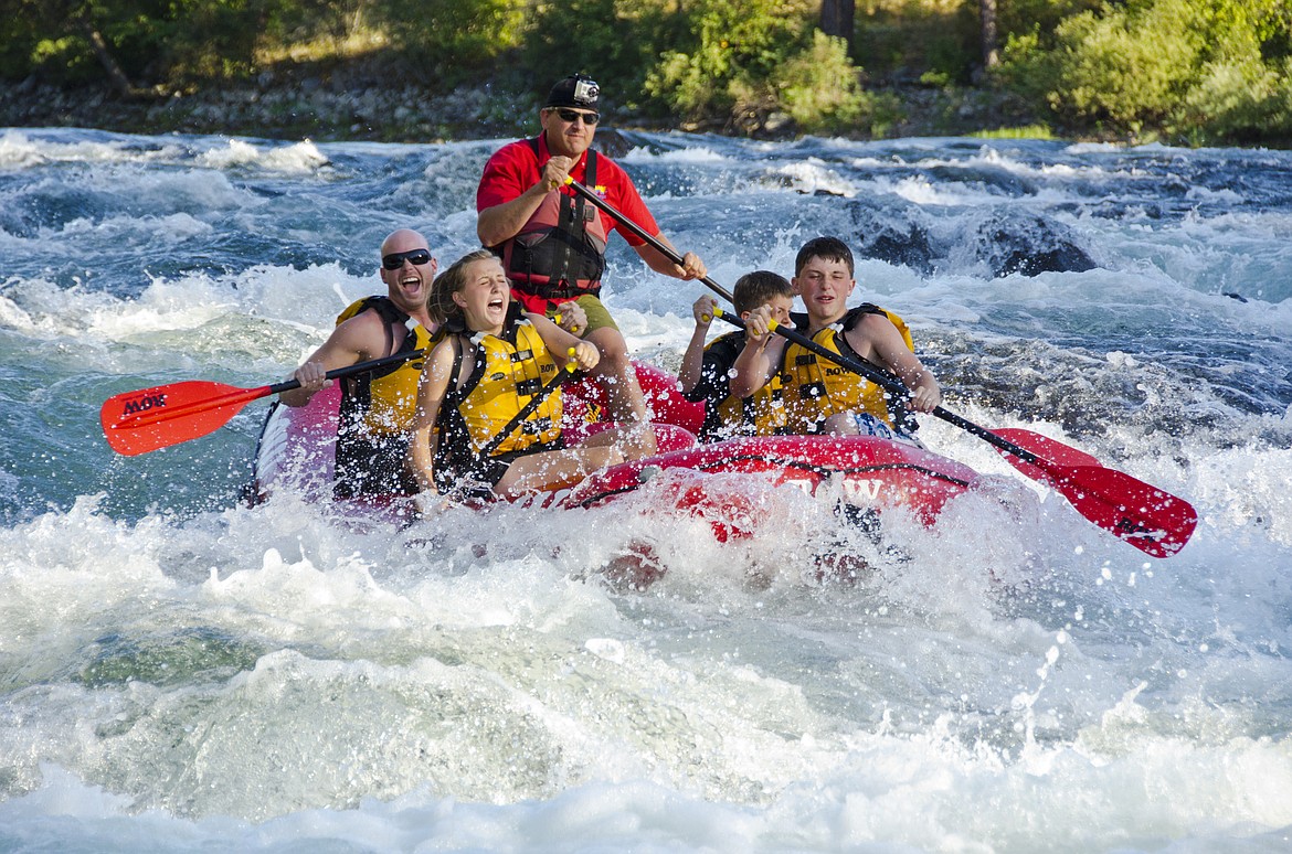 Photo courtesy of CHAD CASE AND ROW ADVENTURES
A ROW Adventures river rafting tour splashes through whitewater on the Spokane River. ROW and other adventure groups are looking forward to high waters and great rafting this season thanks to substantial snowpack.