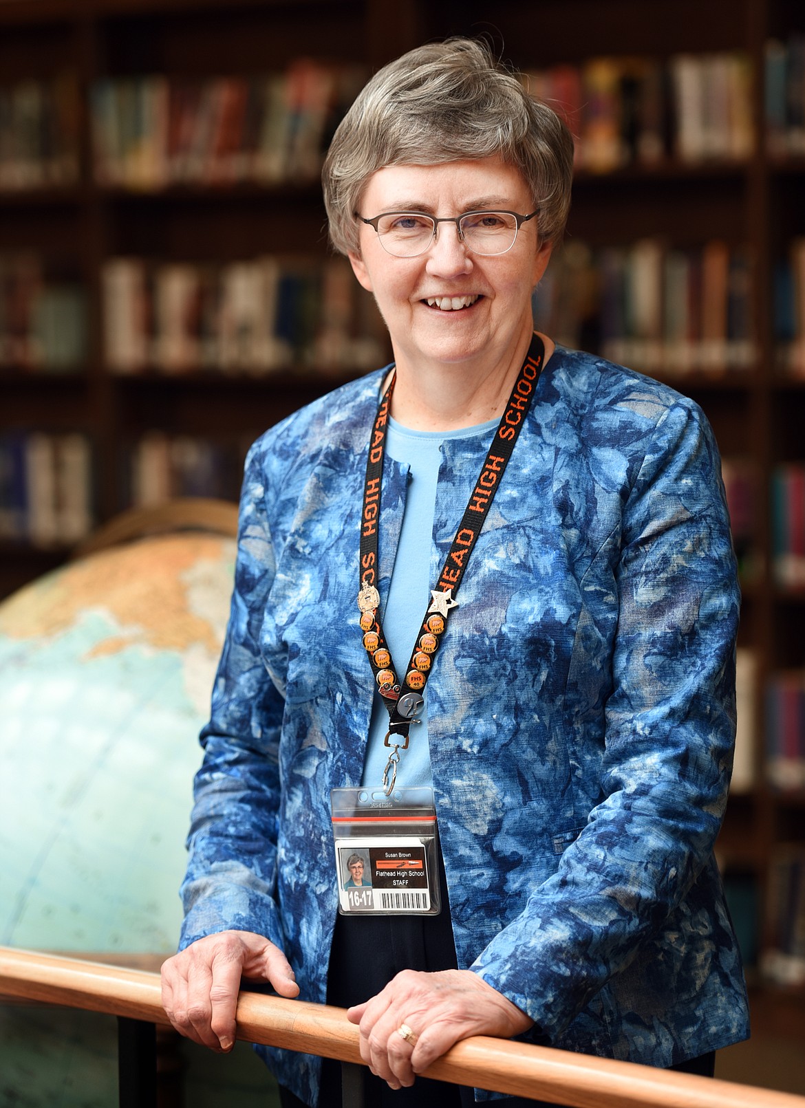 Portrait of Sue Brown, Flathead High School English teacher and department chairwoman on Monday, March 20, at the high school library in Kalispell. (Brenda Ahearn/Daily Inter Lake)