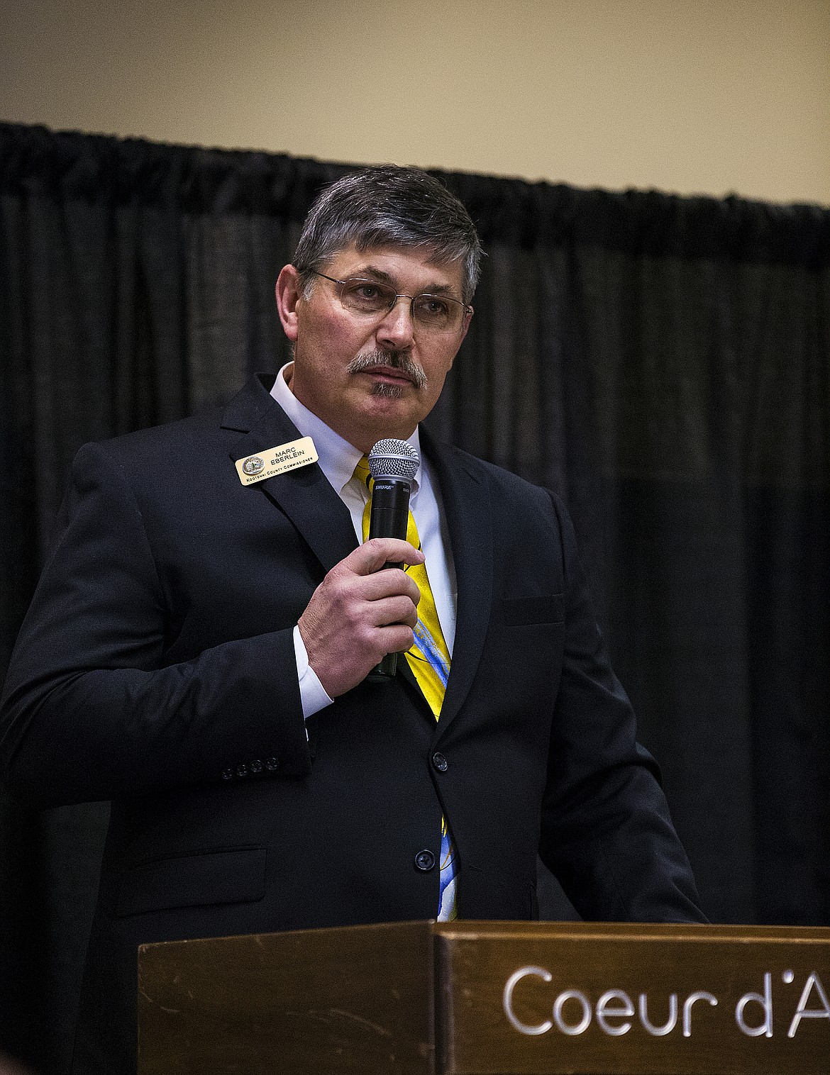 LOREN BENOIT/PressDistrict 1 Kootenai County Commissioner Marc Eberlein speaks to business owners, city officials and members of the community at the State of the County Address Tuesday afternoon at the Best Western Plus Coeur D'Alene Inn.