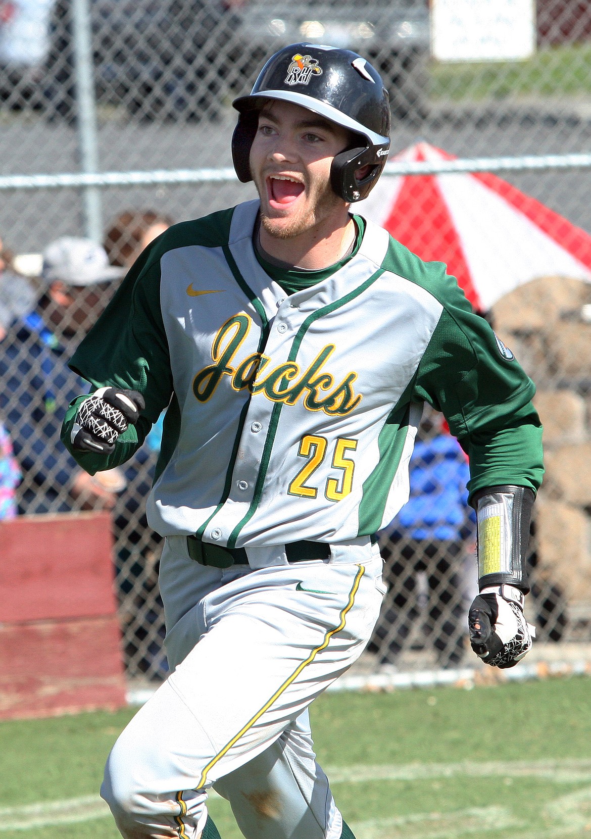 Rodney Harwood/Columbia Basin HeraldQuincy's Doug Tobin reacts after scoring in the top of the sixth inning Saturday during the first game of a CWAC doubleheader with Othello.