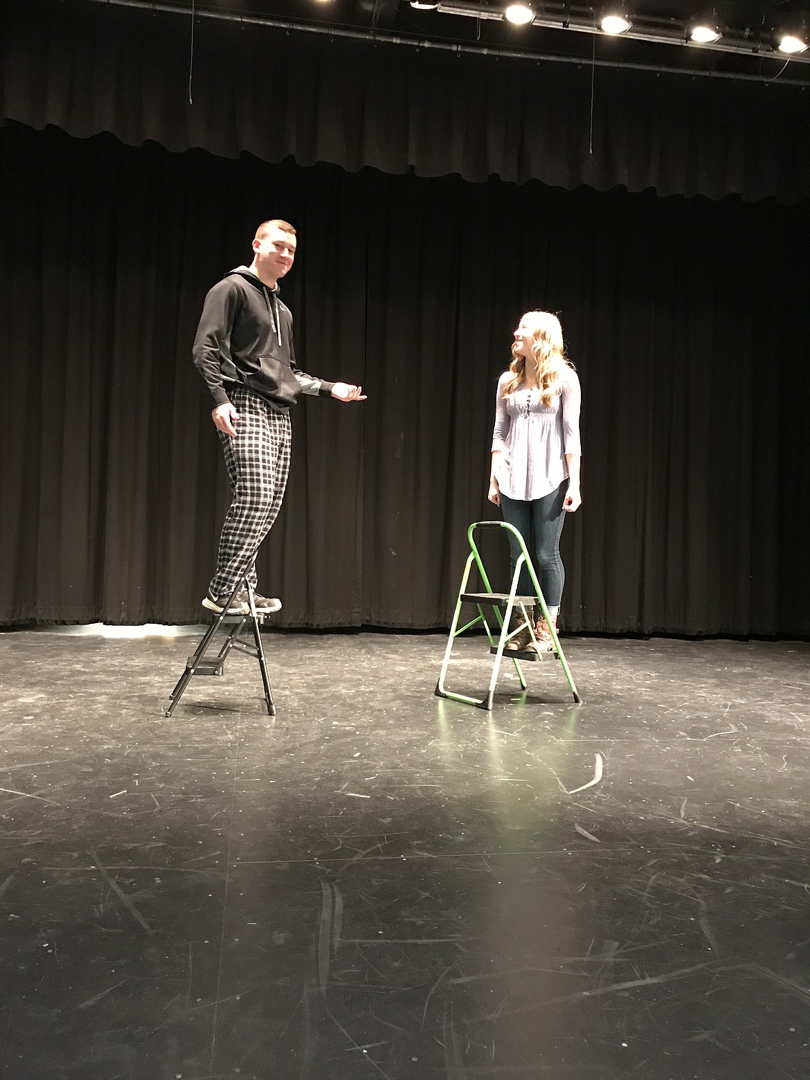 Cheryl Schweizer/Columbia Basin Herald
With no director and no script, high school actors Kyle Mills (left) and Paige Lubach turn &#145;Our Town&#146; into a musical number in the Quincy High School production of &#145;Just Another High School Musical.&#146;