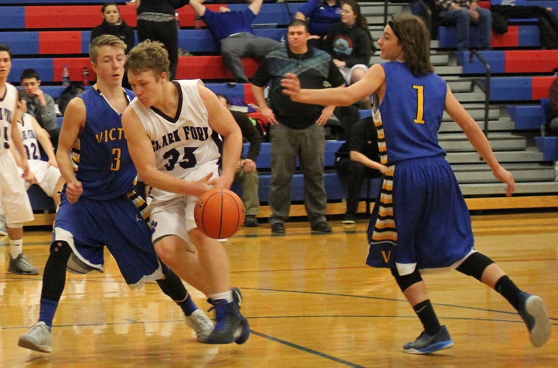 Clark Fork senior Nick Turnbull, #35, was named to the Class C District 13 All-Conference first team in basketball. (Kathleen Woodford/Mineral Independent).