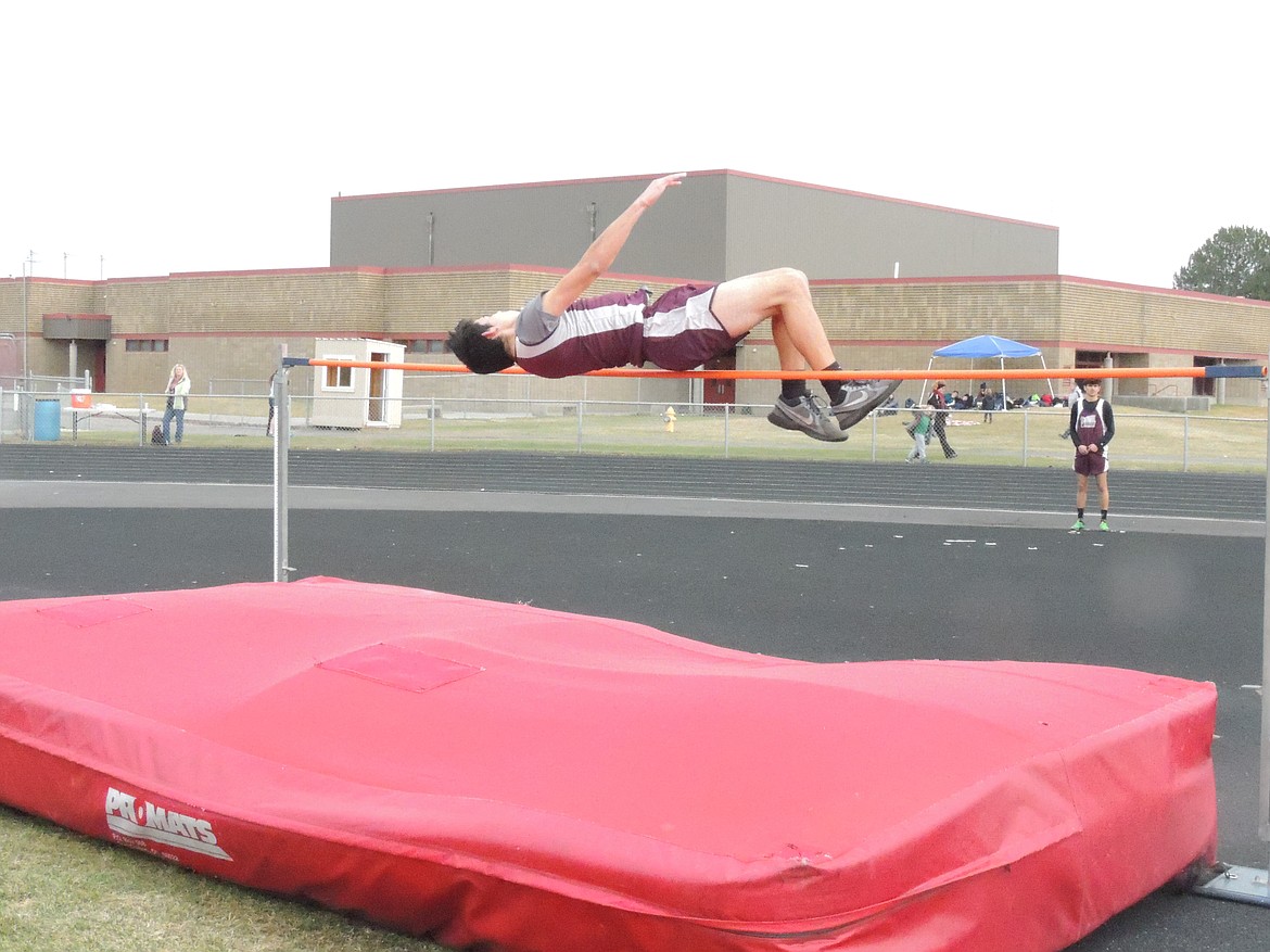 Ted Escobar/The Sun Tribune - Wahluke freshman Oscar Rodriguez clears the high jump bar at 5-2.