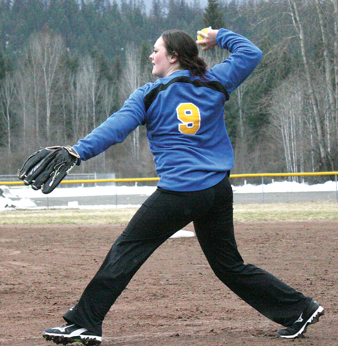 Lady Logger Emily Carvey throwing the ball to the pitcher. (Bethany Rolfson/TWN)
