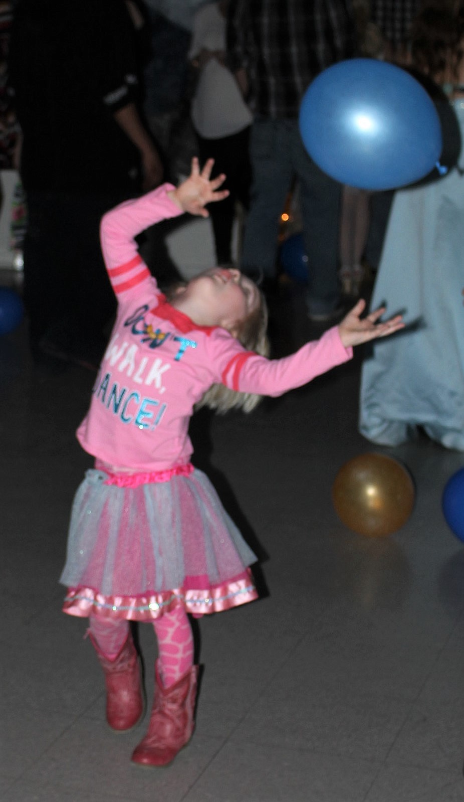 Chasing balloons left over from the prom held the night before was as much fun as dancing for some who attended the Girl Scout Father-Daughter Dance. (Kathleen Woodford/Mineral Independent).