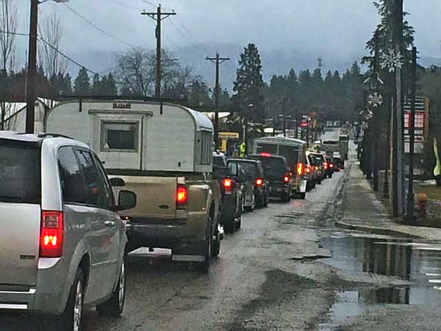 (Photo by STAR SILVA)
About a mile of northbound traffic is held up on Saturday in Bonners Ferry Saturday for about five hours after a mudslide blocks roadways at Ash St. and U.S. Highway 95.