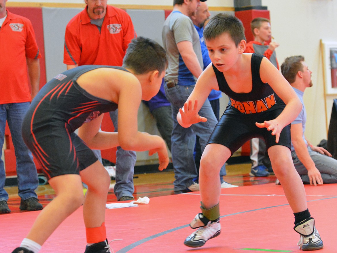 RONAN LITTLE Guy wrestler Tyson Lake attempts to position himself against an opponent in the Little Guy Wrestling Tournament at Arlee High School. (Jason Blasco/Lake County Leader)