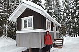 She lives in a tiny house in the woods