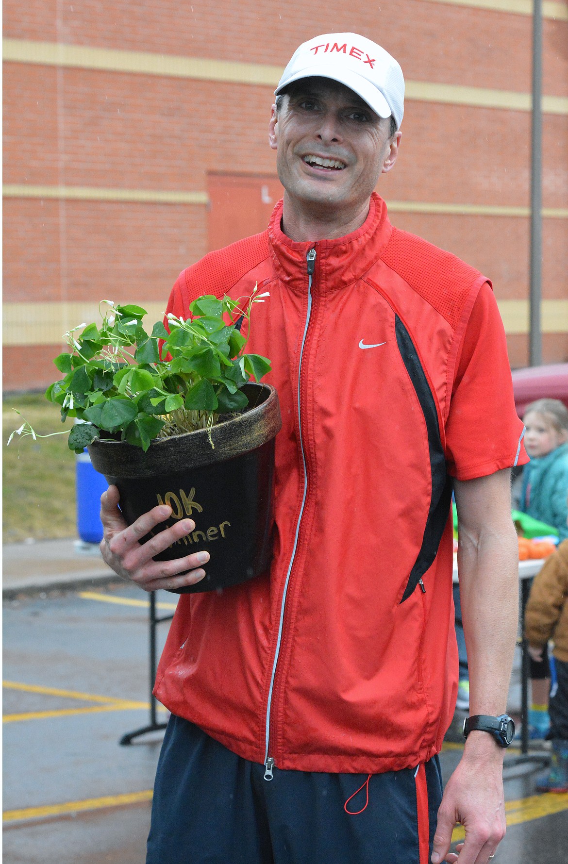 POLSON RUNNING Club member Michael Sitter celebrates after winning the March Meltdown 10K race Saturday morning at Polson Elementary School. (Photo by Jason Blasco/Lake County Leader)