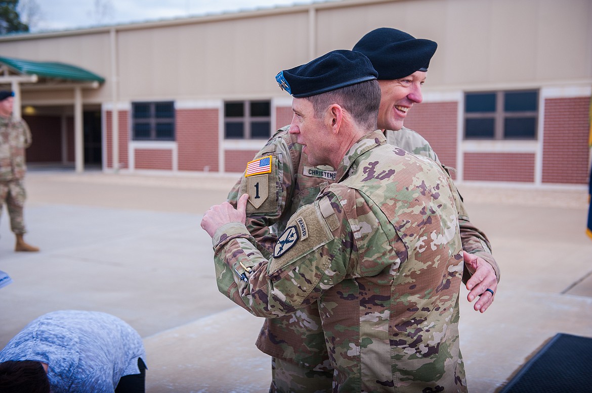 Maj. Gen. Eric J. Wesley congratulates Christensen.