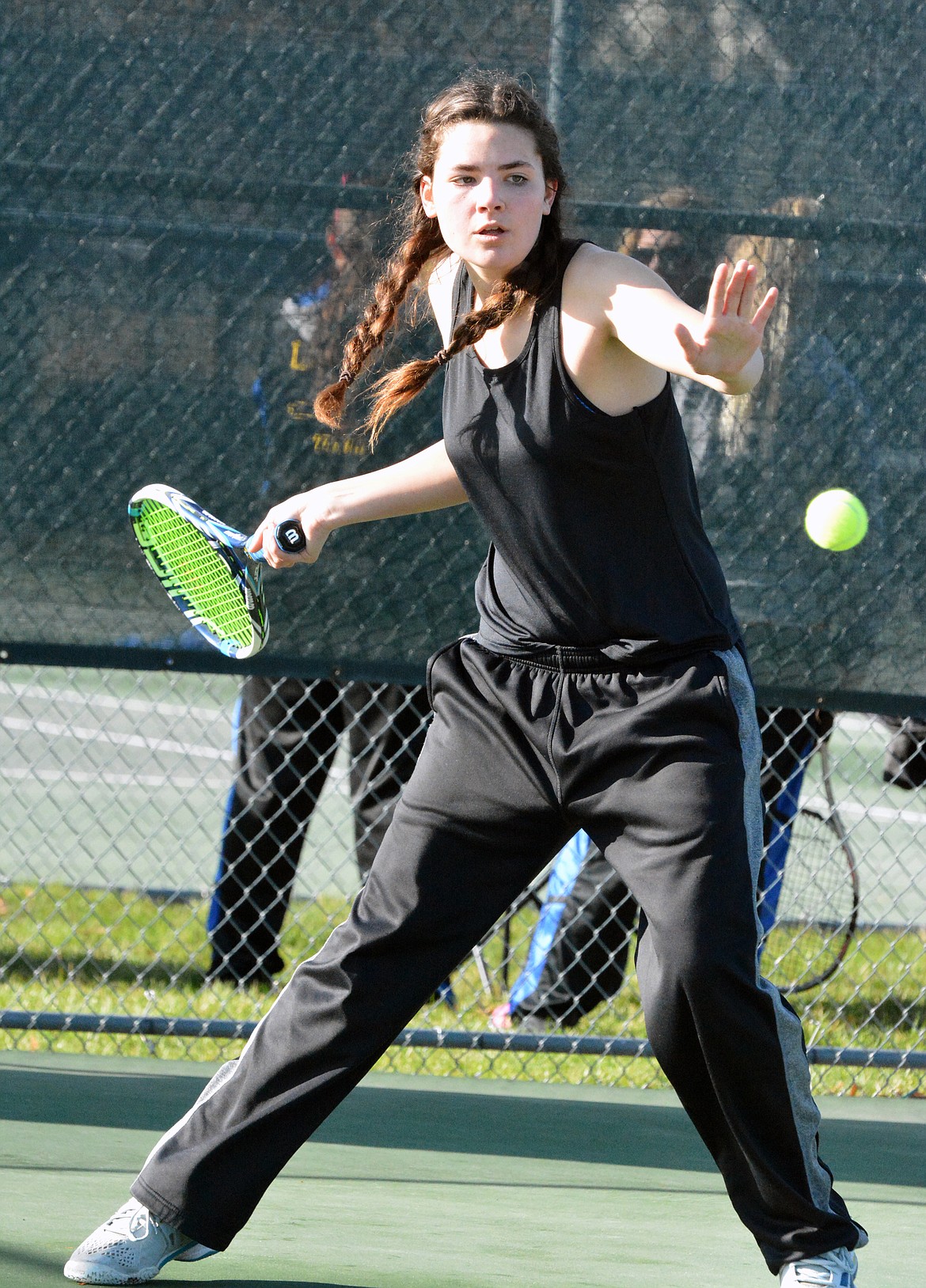 POLSON TENNIS player Cassie&#160;Carlyle returns a serve from Libby&#146;s No. 1 in a singles match Thursday morning at Linderman Tennis Courts in Polson. (Jason Blasco photo/Special to the Daily Inter Lake)