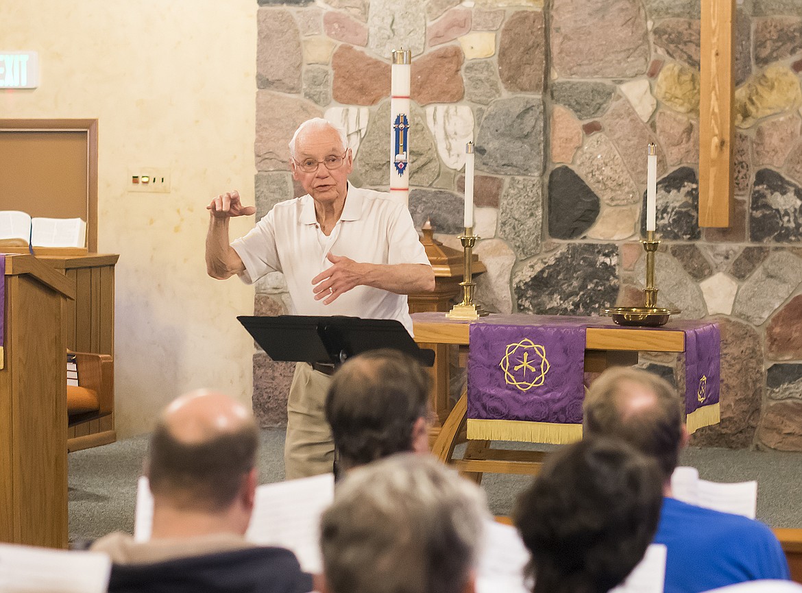 Ron Bond directs the Columbia Falls Community Choir during a practice at the United Methodist Church last week. (Chris Peterson photos)