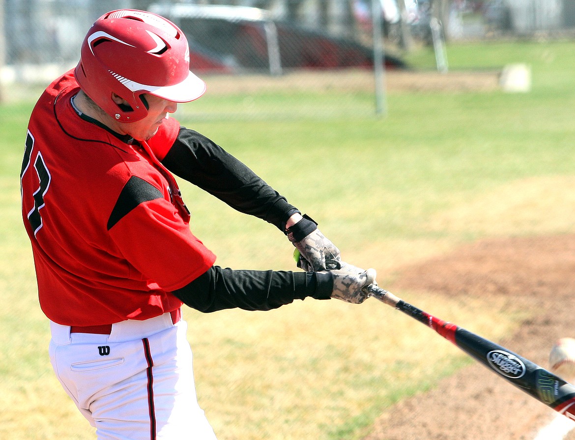 Rodney Harwood/Sun Tribune Othello - third baseman T.J. Martinez (17) drives a ball foul during his at-bat in the bottom of the fifth inning in Game 2 of Saturday's doubleheader.