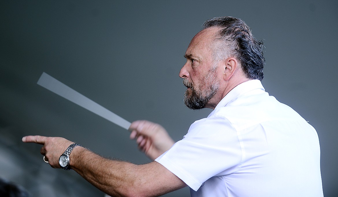 Maestro Zoltek conducting the Glacier Symphony in 2013.